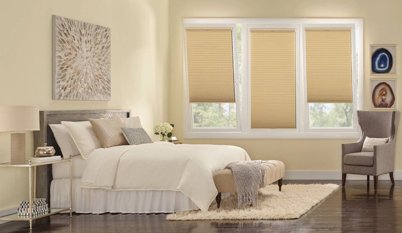 Hunter Douglas Duette® Cellular Shades blocking light in a bedroom near Seneca, SC