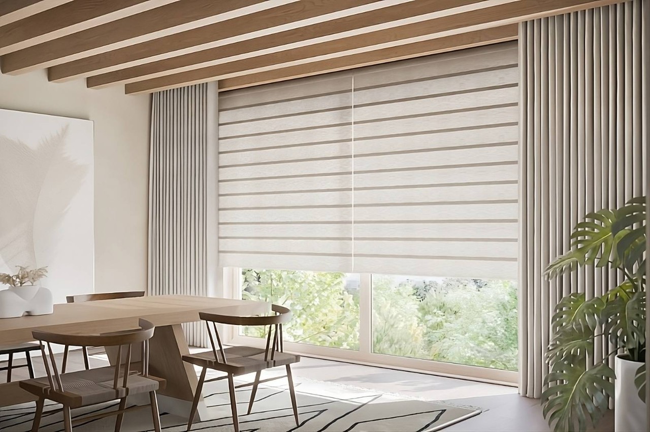 Fabric Roman shades covering a dining window in a home near Seneca & Greenville, SC