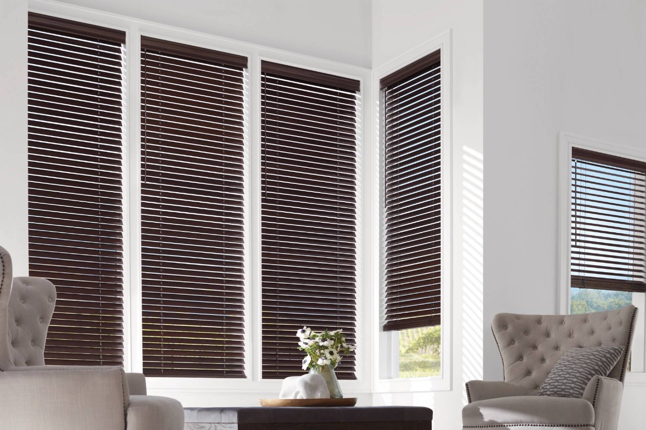 Douglas wood blinds in a modern, white living room at Blinds and Us near Seneca & Greenville, SC